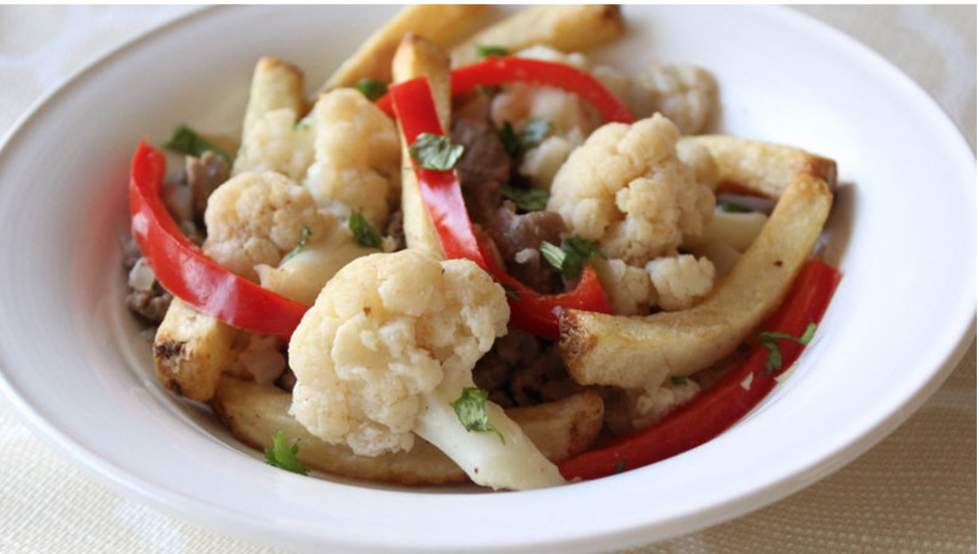 Coliflor Salteada con ternera